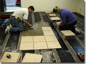 Tile and thinset being installed directly on FloorHeat heating element.